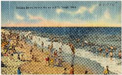 Swimmers packed into the surf at the St. Joseph bathing beach on a mid-century postcard courtesy of Tichnor Brothers, Publisher&nearr; (Public domain&nearr;)