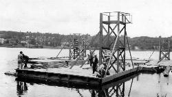 Swimmers on the raft off Seward Park in 1938 courtesy of Seattle Municipal Archives from Seattle, WA&nearr; (CC BY 2.0&nearr;)