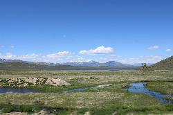 Creek channels winding toward Little Camas Reservoir in May courtesy of Chris Light&nearr; (CC BY-SA 4.0&nearr;)