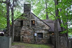 The 1939 stone bathhouse built by the Civilian Conservation Corps beside the lake