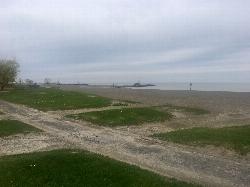 The beach and lake looking northwest on a spring afternoon courtesy of Andre Carrotflower&nearr; (CC BY-SA 4.0&nearr;)