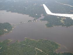Aerial view of Jordan Lake's coves and forested shore courtesy of Mx. Granger&nearr; (CC0&nearr;)