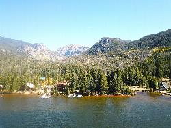 Aerial view across Grand Lake toward the peaks of Rocky Mountain National Park courtesy of Heath Alseike&nearr; (CC BY 2.0&nearr;)