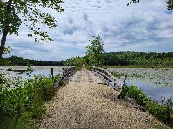 The rail trail causeway crossing the west arm of Contoocook Lake. courtesy of John Phelan&nearr; (CC BY-SA 4.0&nearr;)