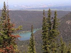 Crystal Lake seen from the ridge above, with the central Montana prairie beyond. courtesy of Forest Service Northern Region from Missoula, MT, USA&nearr; (Public domain&nearr;)