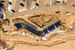Overhead view of the Gillson Beach house and the dunes in front of it. courtesy of Paul R. Burley&nearr; (CC BY-SA 4.0&nearr;)