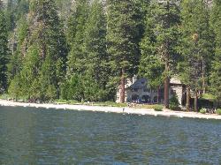 The beach and Vikingsholm seen from the water of Emerald Bay. courtesy of Ken Lund&nearr; (CC BY-SA 2.0&nearr;)