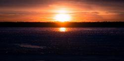 Frozen Oneida Lake at sunset in late December, seen from the Verona Beach State Park beach. courtesy of John Brighenti from Rockville, MD, United States&nearr; (CC BY 2.0&nearr;)