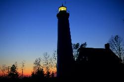 The Tawas Point Lighthouse lit at dusk. courtesy of Chris 