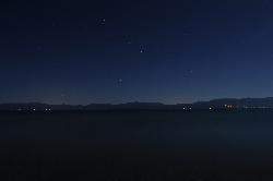 Lake Tahoe at night from Lester Beach, looking east toward the lights of the Nevada shore. courtesy of J.smith This photo was taken by Justin Smith (User:J.smith) and released under the license(s) stated&nearr; (CC BY-SA 3.0&nearr;)