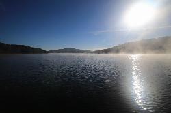 Morning mist rising off Council Bluff Lake on a clear fall day. courtesy of Paul Sableman&nearr; (CC BY 2.0&nearr;)