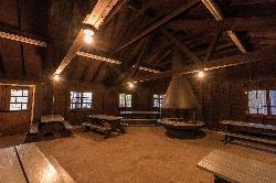 Inside the enclosed picnic shelter near the beach, with its round central fireplace. courtesy of Tony Webster from Minneapolis, Minnesota, United States&nearr; (CC BY-SA 2.0&nearr;)