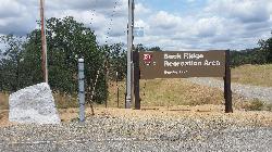 The Corps of Engineers entrance sign for the Buck Ridge Recreation Area, home of the swim beach. courtesy of Mutante&nearr; (CC BY-SA 3.0&nearr;)