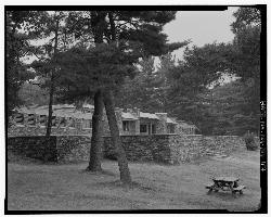 The stone beach house and park office behind West Beach, photographed for the Historic American Engi courtesy of Haas, David W., creator&nearr; (Public domain&nearr;)