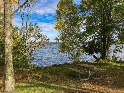 A picnic table on the Lake Gogebic shoreline inside the state park in early autumn. courtesy of Tony Webster&nearr; (CC BY 2.0&nearr;)