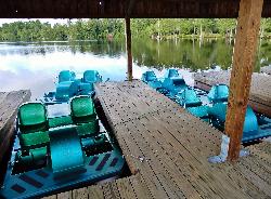 Paddleboats at Jones Lake, where the boathouse beside the swim beach rents them in summer. courtesy of ncwetlands.org&nearr; (CC0&nearr;)