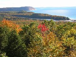 Fall color around North Bar Lake, with Empire Bluff and Lake Michigan beyond. courtesy of NOAA Great Lakes Environmental Research Laboratory&nearr; (CC BY-SA 2.0&nearr;)