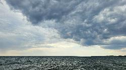 Storm clouds and building waves on Lake Huron off the day-use beach. courtesy of Ken S Three&nearr; (CC BY-SA 4.0&nearr;)