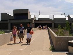 Beachgoers on the walkway between the West Beach bath house and the sand. courtesy of Chris Light (talk)&nearr; (CC BY-SA 3.0&nearr;)