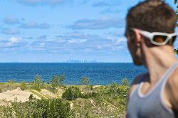 Lake Michigan and the Chicago skyline seen from the dunes above West Beach. courtesy of Indianadunes&nearr; (CC BY 4.0&nearr;)