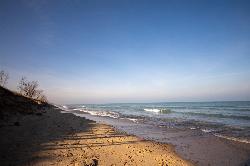 Looking west along the West Beach shoreline with waves breaking on the sand. courtesy of Matthew Dillon from Hollywood, CA, USA&nearr; (CC BY 2.0&nearr;)