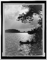 Canoeists on Goguac Lake in an early 1900s photograph. courtesy of Miscellaneous Items in High Demand, PPOC, Library of Congress&nearr; (Public domain&nearr;)