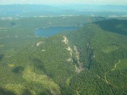 Aerial view of Tally Lake from the west, with Tally Gorge in the foreground (USFS, 2006). courtesy of Forest Service Northern Region from Missoula, MT, USA&nearr; (Public domain&nearr;)