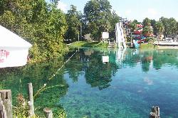 Clear spring water at Buccaneer Bay looking toward the water slides. courtesy of floridasprings&nearr; (CC BY 2.0&nearr;)