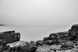 Bedrock ledges at the water's edge in Roque Bluffs State Park on a foggy day. courtesy of KimCarpenter NJ&nearr; (CC BY 2.0&nearr;)