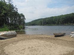 Rowboats pulled up on the sand at the edge of Canopus Lake. courtesy of TheTurducken&nearr; (CC BY 2.0&nearr;)