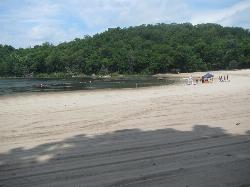 The guarded swim area at Canopus Beach with the lifeguard stand on the sand. courtesy of TheTurducken&nearr; (CC BY 2.0&nearr;)