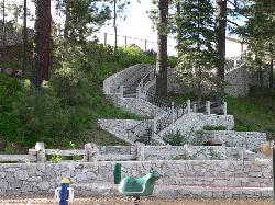 Stone stairways leading down the bluff from North Lake Boulevard to the Commons Beach playground and courtesy of basykes&nearr; (CC BY 2.0&nearr;)