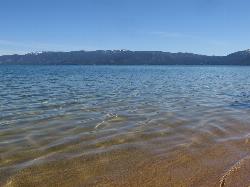 Clear, shallow water over sand at the edge of Pope Beach. courtesy of Ken Lund&nearr; (CC BY-SA 2.0&nearr;)