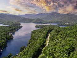 A long arm of Santeetlah Lake below forested ridges, near Cheoah Point. courtesy of Harrison Keely&nearr; (CC BY 4.0&nearr;)