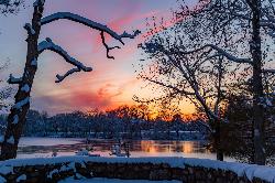 Sunset over Houghton's Pond in winter. courtesy of Eric Moreno&nearr; (CC BY 2.0&nearr;)