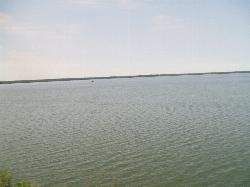 Open water of Pymatuning Lake seen from the causeway east of Andover in summer. courtesy of Michael A. Orlando&nearr; (CC BY-SA 3.0&nearr;)