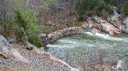The ruined Silver Mine Dam on the St. Francis River inside the recreation area, photographed in Apri courtesy of Formattc at English Wikipedia&nearr; (CC BY-SA 3.0&nearr;)
