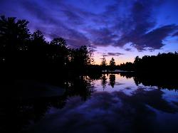 Lake Wazeecha after sunset, looking across the water toward the wooded shore. courtesy of summer_day008&nearr; (CC BY-SA 2.0&nearr;)